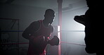 Boxer, coach and men with training for fitness in boxing ring with punch workout, agile fighting skills and intense action. Impact sport, preparation and personal trainer with gloves for self defense