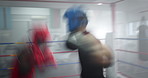 Boxing ring, hit and men in gym with fight, action and champion athlete training for competition together. Gloves, hit and speed boxer with fitness coach, exercise or workout challenge at fight club
