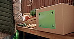 Hands, vegetables and green screen on food box, person or mockup space for charity drive at farm. Donation, farmer or volunteer with package for nutrition, chromakey or nonprofit at market in England