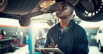 Mechanic, inspection and checklist with black man and car in auto repair shop for diagnostic system, transport or calibration. Engineering, maintenance or motor technician with person in garage