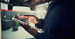 Mechanic, tablet and hand with man and repair in car shop for diagnostic test, transport or calibration. Engineer, maintenance or motor technician with person in garage for inspection, auto or report