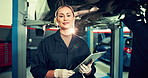 Mechanic, clipboard and face of woman and car in auto repair shop for diagnostic test, transport or calibration. Engineering, maintenance or motor technician with portrait of person in garage