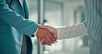 Office, closeup and business people with handshake for deal, partnership or success for negotiation. Boardroom, teamwork and employees with shaking hands for welcome, promotion or corporate agreement
