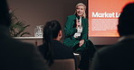Stage, marketing and leader with woman at seminar for keynote speaker, symposium and networking expo. Panel forum, insight and business innovation showcase with mature person for live summit