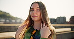 Serious, gen z and student with face of woman in city for youth, culture and Identity. Summer, fashion and cool with portrait of person in urban new York downtown for vacation, trends and style