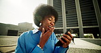 Happy, black woman and typing with phone outdoor for reading funny meme, social media and communication. Smile, girl and laugh with mobile of online blog, streaming video and texting contact in urban