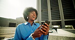 Smile, black woman and typing with phone outdoor for reading funny meme, social media and communication. Happy, girl and laugh with mobile of online blog, streaming video and texting contact in urban