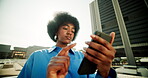 Black woman, typing and serious with phone outdoor for reading email, social media and communication. African, girl and scroll with mobile of online blog, streaming video and texting contact in urban