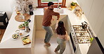 House, couple and dancing in kitchen with food or ingredients for meal prep with fun. People, above and happy or smile in relationship with fruit for juice or smoothie in bonding, support and care