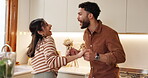 Home, couple and smile with dancing in kitchen at home for fun, support and caring as lovers. People, relationship and happy or excited for music, playlist and audio at apartment with meal prep