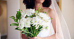 Woman, hands and bride with bouquet of flowers for marriage, commitment or big day in wedding dress. Closeup, young or female person with natural or floral plant for beauty or elegance at house