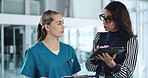 Business, woman and nurse with tablet in hospital for healthcare management and medical administration. Medicine, clinic hr manager and talking to person for online patient system and insurance claim