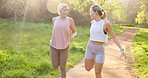 Fitness, park or stretching with mother and daughter outdoor in summer for cardio or marathon training. Exercise, runner or workout with mature parent and woman in forest for start of warm up routine