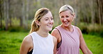 Conversation, exercise and park with mother and daughter outdoor in summer for cardio or marathon training. Fitness, laughing or walking with mature parent and woman in forest for start of workout