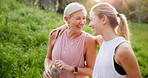 Fitness, hug or walking with mother and daughter outdoor in summer for cardio or marathon training. Conversation, exercise or water with mature parent and woman in forest for start of workout