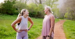 Mature mother, daughter and happy for fitness with morning walk, run and exercise in Germany. People, family and smile or laugh on conversation in park with bonding, support and  jogging for health