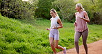 Mature mom, daughter and happy with running at park for fitness, health and self care in Germany. People, family and smile or satisfied  with morning jog, exercise and workout for bonding and support