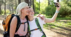 Outdoor, mother and woman with selfie for hiking, document  memory and profile picture for social media. Nature, senior mom and adult daughter with photography for bonding together, smile and fitness