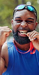 Medal, celebration and face of black man at race in nature with pride for fitness goal or achievement. Happy, win and portrait of African athlete with gold award for marathon with cardio exercise.