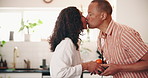 Kiss, couple and love in kitchen with breakfast, food and ready for work in home. Smile, bonding and romance with man, woman and cutting for healthy meal with morning routine or support in house