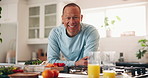 Face, smile and man in kitchen for cooking healthy food, meal prep or vegetables for vegan diet. Portrait, chef and mature person in home with ingredients for nutrition, wellness and laugh in Mexico