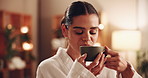 Calm woman, relax and spa with coffee for morning, zen or sensation in comfort for stress relief at luxury resort. Young, female person or warm drink and beverage with smile for relaxation at salon