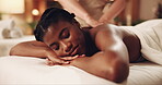 Woman, hands and back massage with skincare at spa for muscle tension, luxury treatment and body pamper. Wellness zen, masseuse and apply pressure on client for pain relief, relax and healing therapy