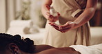 Hands, massage and oil with woman relax at spa for luxury wellness, aromatherapy and skincare healing. Girl, rest and masseuse with essential product for holistic hospitality, self care and treatment