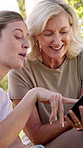 Mature mother, daughter and hiking with phone for map, internet navigation and talk for travel direction in forest. Woman, girl and smartphone in woods for path research, location or trekking break