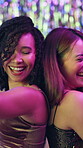 Women, friends and happy with dancing at night club for party, festive season and new year celebration in Spain. People, confident and smile or satisfied with music, disco and entertaining at event