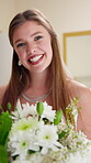 Wedding, face and happy woman with flowers, smile and elegant glamour for marriage and bride in event. Portrait, proud and bouquet for decoration style and ceremony in resort hotel for celebration