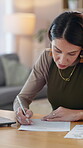 Business, documents and laptop with mature woman at desk in office for administration or research. Computer, contract and proposal with professional employee in workplace for project management