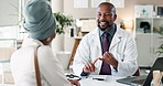 Healthcare, doctor and woman with advice for consultation, medical appointment and checkup. Black people, patient and cardiologist in hospital with discussion for clinic service, feedback and smile