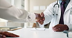 Closeup, doctor and patient with handshake for welcome, medical appointment or ok sign in clinic. People, client or cardiologist in hospital with shaking hands for introduction, consultation or greet