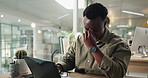 Black man, stress and laptop with headache for strain, pressure or overworked at office desk. Frustrated African, male person or tired employee with migraine or pain for fatigue, burnout or mistake