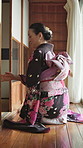 Tea room, sliding door and Japanese woman with respect, balance and traditional home ready for ceremony service. Culture, heritage and kimono dress for mindfulness, matcha and hospitality as art form