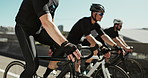 Bridge, sports and athletes cycling in city for race, triathlon or marathon training with cardio. Fitness, cyclists and men with workout or exercise on bike in town for outdoor tour or activity.