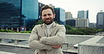 Face, businessman and outdoor with arms crossed in city for property and infrastructure development in Germany. Male person, employee and smile or proud on portrait with confidence for real estate