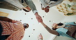 Handshake, business people and low angle with group in office, celebration and goals at company. Men, women and shaking hands with circle, success or teamwork for synergy with deal at creative agency
