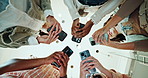 Business people, hands and typing below with phone in circle for data sync, share or communication at office. Low angle, group or employees with mobile smartphone for network or connectivity together