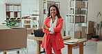 Boxes, logistics and woman with arms crossed, face and happy for order, ecommerce and entrepreneur. Laptop, person and smile for delivery, supplier and distribution of stock in small business
