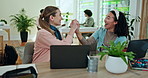 Laptop, surprise and business women high five for success, win or team laugh together. Computer, friends or celebrate goal achievement, good news or performance of magazine editor in creative startup