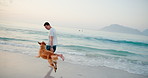 Ocean, travel and man with dog, running and vacation with happiness, bonding together and game. Beach, coastline and person with pet, golden retriever or summer holiday with nature, smile or Zanzibar