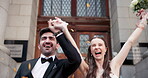 Woman, man and wedding day with love, confetti and joy for ceremony, marriage and commitment. Happy couple, celebration and together for care, partnership and bonding as playful for reception in city