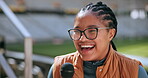 Woman, microphone and happy in stadium for interview, press conference and sport with broadcast. Journalist, laugh and media relations presentation in arena for fitness event, television and news