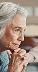 Thinking, house and sad with mature woman, depression and mental health with retirement. Apartment, pensioner and senior person with nostalgia, remember and contemplation with memory and thoughtful