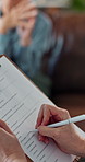 Psychologist, hands and writing in office for mental health, notes and checklist for patient care. Person, client or clipboard in practice for evaluation, psychiatrist procedure or closeup assessment