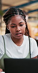 Woman, student and video call with writing notes for project, listen or education with elearning. African person, girl and laptop with studying, scholarship or development for assessment at college