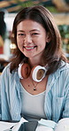Student, face and books with asian woman in cafeteria for studying, portrait and college thesis. University, learning and education with person on school campus for knowledge, future and youth.