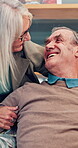 Love, relax and embrace of mature couple, romance and celebration of commitment in marriage, care or home. Hug, smile and senior people in house, happy and trust in relationship, couch or living room